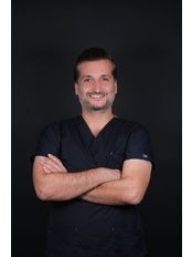 Mr Hakan Cavdar, Dentist — Over the Moon Smile