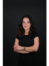 Mrs Nihal Atasoy Karakilcik — Over the Moon Smile
